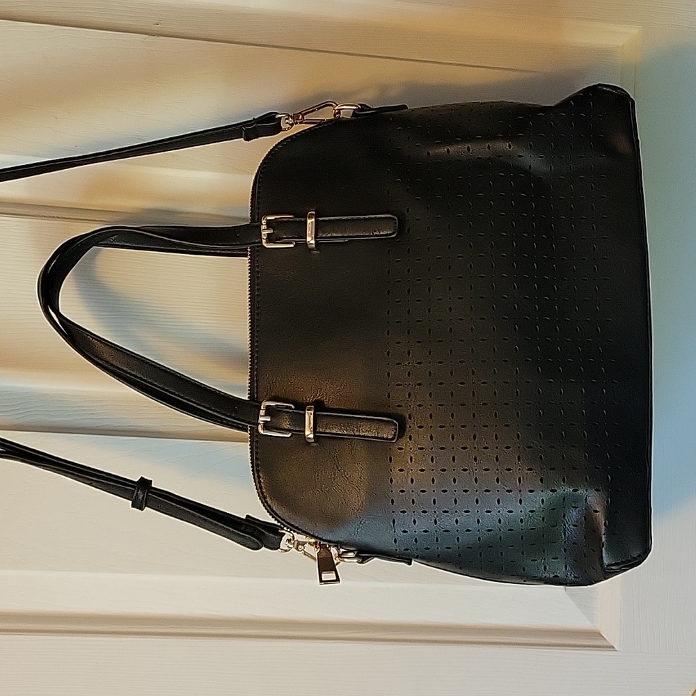 Urban Expressions black handbag with adjustable, removable strap.